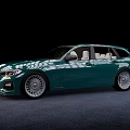 Modern Green Station Wagon With Shiny Exterior And Silver Alloy Wheels