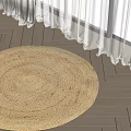 Natural Woven Round Rug On Light Wooden Floor With White Curtains