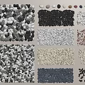 Various Colored Natural Pebbles And Stones In Different Patterns And Textures