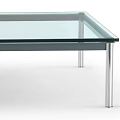 Modern Coffee Table With Clear Glass Top And Sleek Metal Frame Design