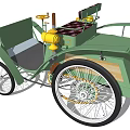 Vintage Green Car With Yellow Accents And Classic Spoke Wheels Design
