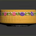 Yellow Decorative Bowl With Colorful Floral Patterns And Green Leaves On Edge