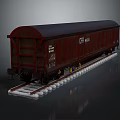 Red Train Carriage Parked On Railway Tracks With White Text And Numbers Against Dark Background