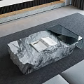 Modern Marble Coffee Table With Glass Top And Magazines In Living Room With Gray Sofa