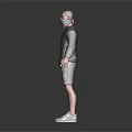 A Man in Black Hoodie and Camouflage Shorts White Sneakers Standing on Reflective Black Background
