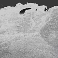 Natural Layered Rock Formation Displaying Textured Geological Structure In Landscape