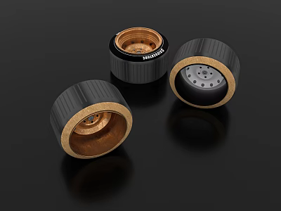 Premium Black Tires With Shiny Brass Rims And Textured Tread Design 3d model