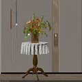 Corner Table With White Lace Tablecloth Vase Red Flowers Green Leaves Wooden Legs Golden Lights