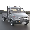 Silver Utility Flatbed Truck With Cab For Outdoor Road Transportation And Practical Use