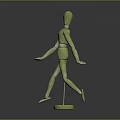 Green Wooden Mannequin Character Standing on Round Base with Smooth Surface