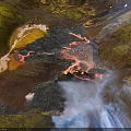 Volcanic Terrain With Active Lava Flows Green Yellow Land Surfaces And Rising Steam