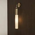Modern Brass Wall Light With Cylindrical White Shade On Dark Wooden Wall Warm Glow