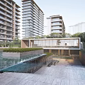 Modern High Rise Residential Complex With Water Features Glass Structure Courtyard Stone Pavement And Greenery