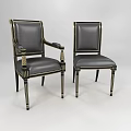 Ornate Black Leather Dining Chairs With Gold Accents And Armrest Details