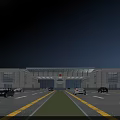Grand Stone Entrance Gate with Symmetric Buildings and Vehicles on Road