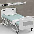 White Medical Bed With Wheels Pillow And Light Blue Bed Sheet Against Gray Wall