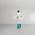 Man Standing In Modern Open Kitchen Interior With Bright Design And Spacious Layout