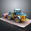 Blue And Yellow Construction Loader With Front Bucket And Large Tires On Flat Surface