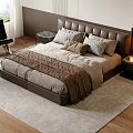 Modern Bedroom Interior With Leather Headboard Multiple Pillows Brown Throw Blanket And Wooden Floor