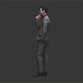 A Man In Gray Suit Red Tie Talking On Phone With Hand In Pocket