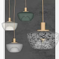 Modern Glass Pendant Lights With Golden Bases And Various Designs In Grey Background