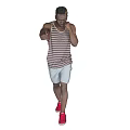 Man in Striped Tank Top White Shorts Red Sneakers Practicing Boxing Stance on Gray Background