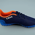 Navy Blue Soccer Shoes With Orange Tongue White Stripes And Blue Traction Outsole