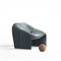 Modern Gray Fabric Lounge Chair With Curved Design And Wooden Decorative Ball