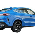 Blue BMW Coupe Style SUV With Sleek Design Black Wheels And Front Grille
