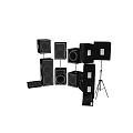 Various Black Audio Speakers In Different Sizes And Shapes On Stands And Floor