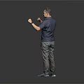 Man In Dark Blue Shirt Gray Pants Posing With Boxing Gestures On Gray Background