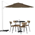 Stylish Outdoor Table With Four Chairs Beige Umbrella And White Stand In Outdoor Setting