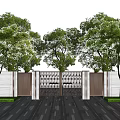Modern Entrance Gate With Metal Grille Design And Surrounding Trees On Paved Ground