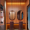 Hotel Lobby Interior Featuring Circular Fireplace Arched Window Pink Walls Sofas And Hanging Pendant Lights