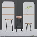 Three Modern Bar Stools With Brown Seats Black Legs And Wooden Shelves Background