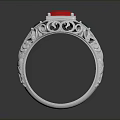 Silver Ring Featuring Red Central Gemstone Green Accent Stones And Intricate Carvings