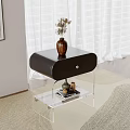 Modern Bedside Table with Black Leather Top Transparent Acrylic Frame Vase Dried Flowers and Books