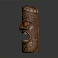Traditional Wooden Tiki Mask With Intricate Carved Patterns And Red Glowing Eyes
