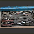 Open Vintage Toolbox with Blue Lid and Red Base Containing Hardware Tools Pliers and Screwdrivers