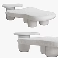 Sleek Modern Beige Coffee Table With Irregular Smooth Surface And Cylindrical Support Legs 3d model