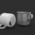 Two Ceramic Mugs White And Silver One Tipped Over With Worn Details And Handles
