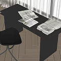Modern Dark Desk With Stacked Newspapers Black Chair And Wooden Floor