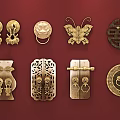 Traditional Brass Door Knockers With Various Intricate Patterns On Red Background