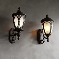 Vintage Style Wall Sconces With Black Metal Frame And Glass Shade Illuminated On Gray Wall