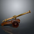 Antique Brass Cannon with Wooden Carriage Featuring Ornate Wheels and Decorative Engravings
