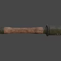 Vintage Military Weapon Featuring Cylindrical Metal Top And Wooden Handle Design