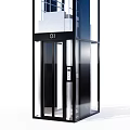 Sleek Modern Elevator With Transparent Glass Exterior Metal Frame And Blue Top