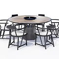Modern Round Dining Table Set With Six Black Frame Chairs And White Cushions