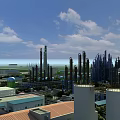 Large Industrial Plant With Multiple Chimneys Metal Pipes And Factory Buildings Under Blue Sky