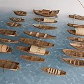 Various Traditional Wooden Boats Floating on Calm Blue Water Surface
